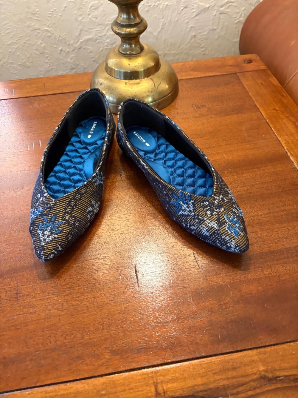Birdies Navy and Gold Pointed-Toe Floral Ballet Flats